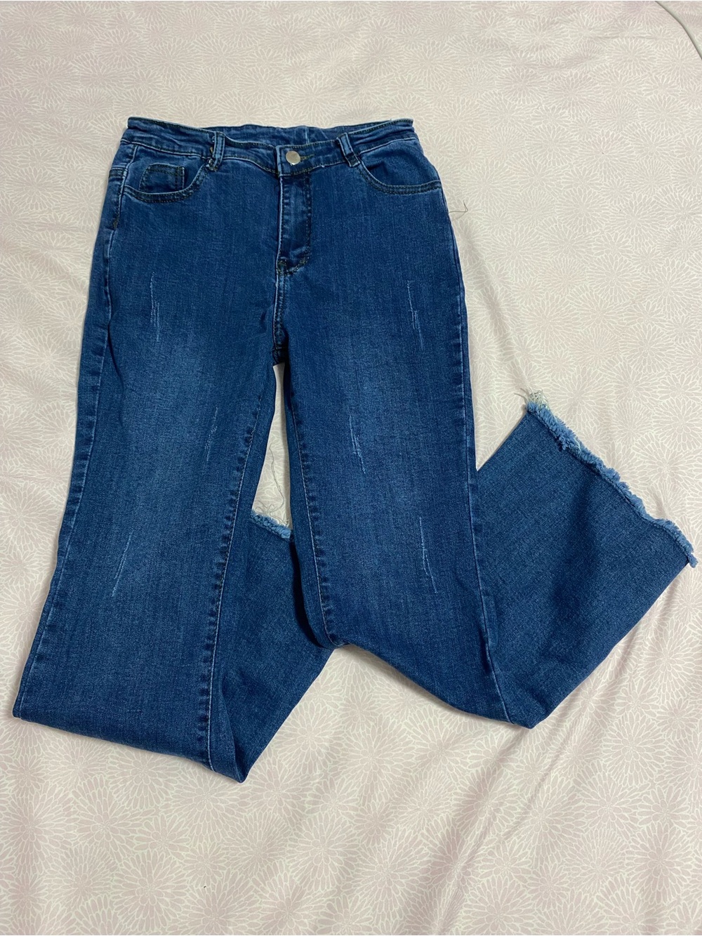 High-Rise Indigo Flare Jeans with Frayed Hem
